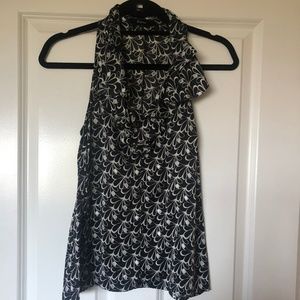 Express Sleeveless Retro Inspired V-neck blouse